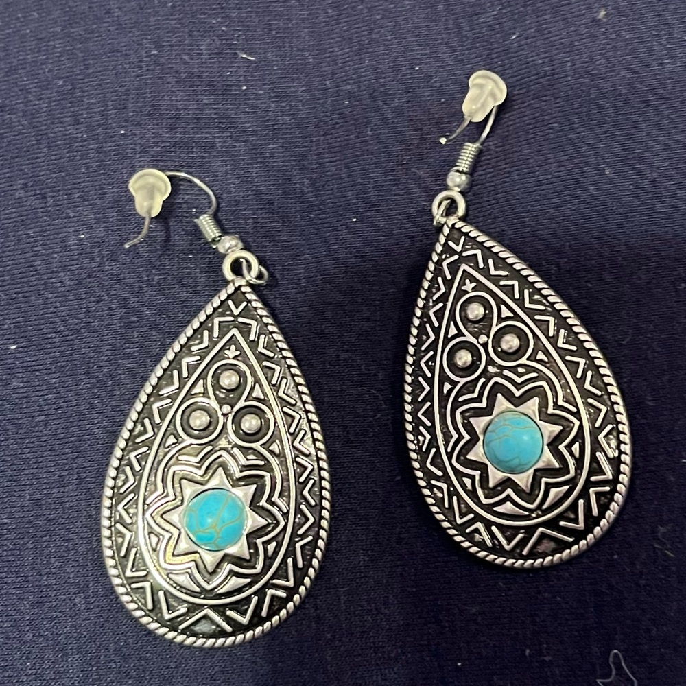 Silver tone pierced earrings with turquoise stone. EUC